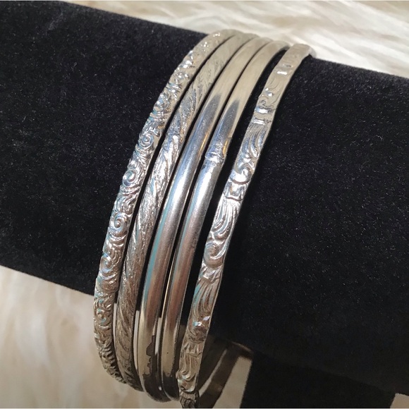 2 Smooth 3 embossed silver-tone connected bangles totaling 2.75” - Picture 1 of 3